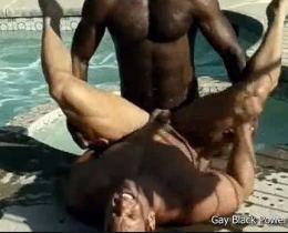 Hot black guy fucking a muscular gay white hunk in the pool
